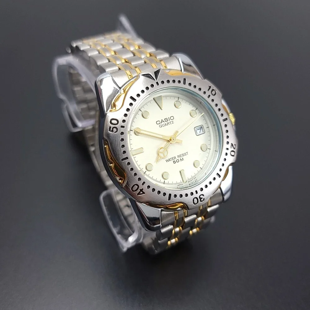 NEW Vintage Casio Mens Watch Silver/Gold with Date Adjust Water‎ Resistant 50M